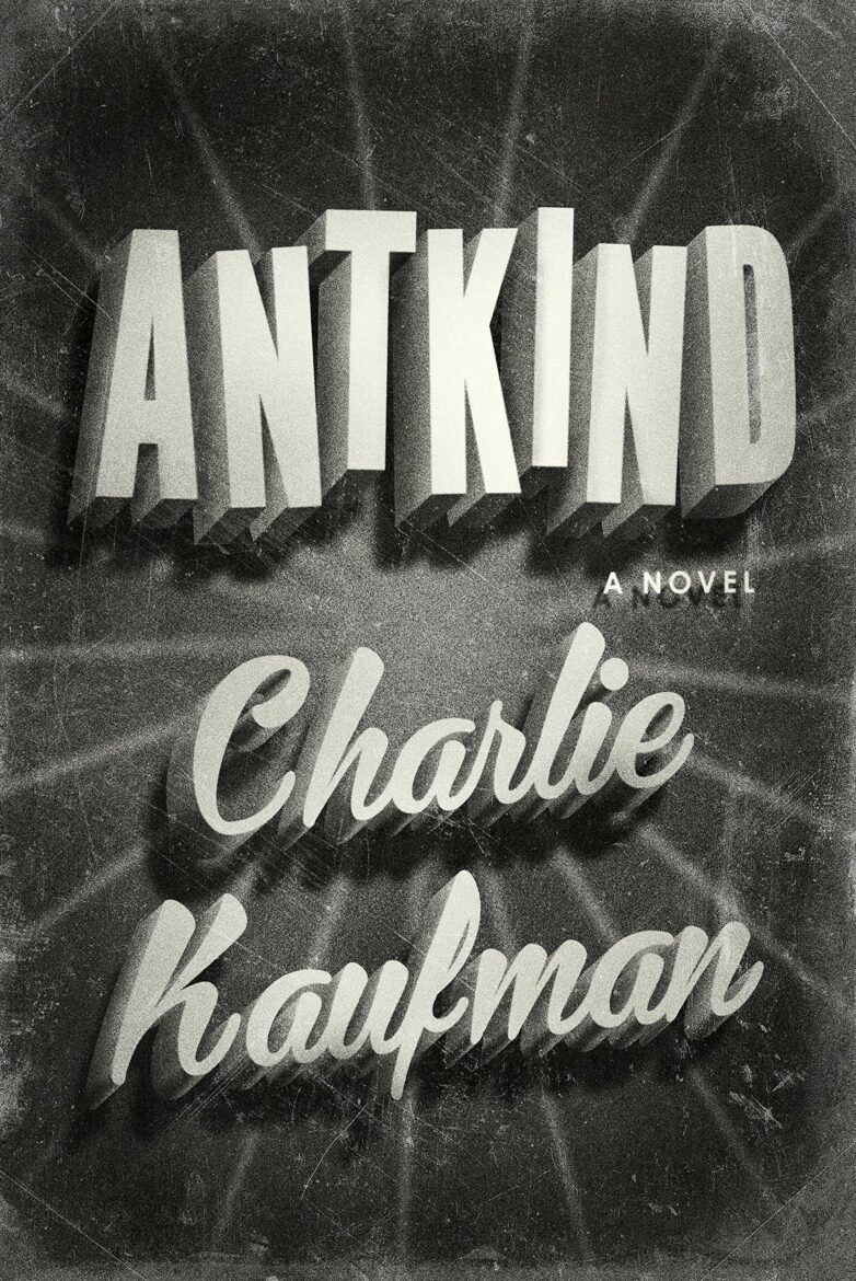 The cover of the book "Antkind: A Novel" by Charlie Kaufman. The title "ANTKIND" appears in bold, three-dimensional block letters at the top, with the author's name "Charlie Kaufman" in a cursive script below. The background has a starburst pattern.